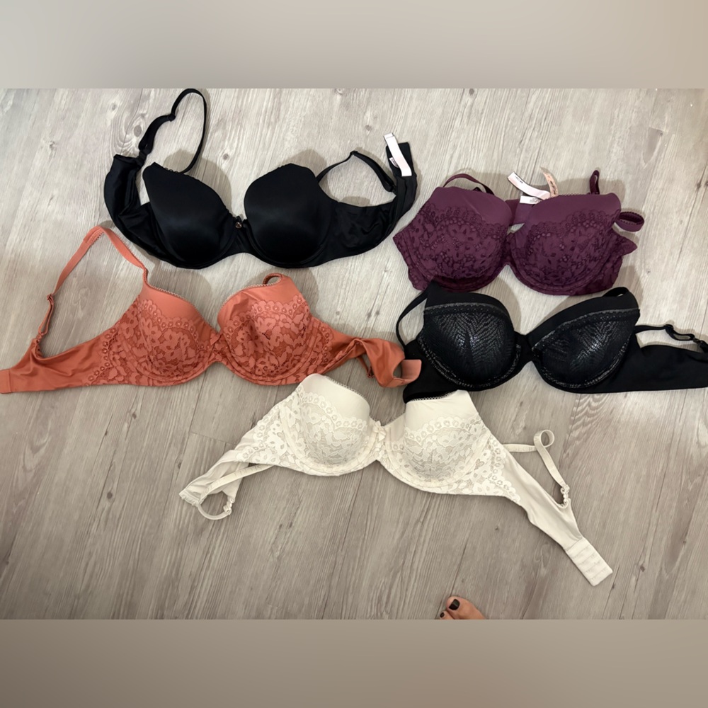 Victoria's Secret 2 Black, Purple, peach, and white Bras. Never worn.